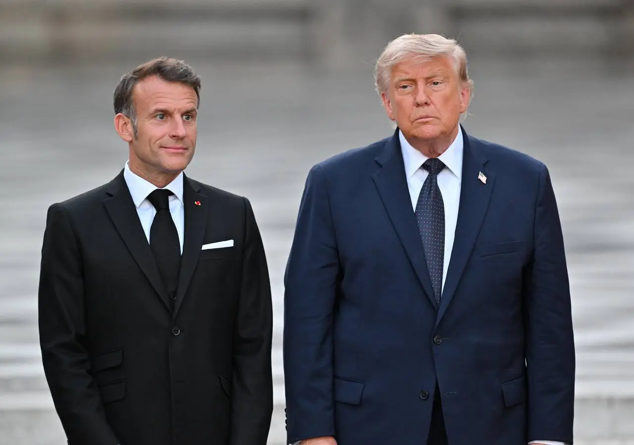El presidente de Estados Unidos, Donald Trump, y el presidente francés, Emmanuel Macron, asisten a una cena en el Palacio de